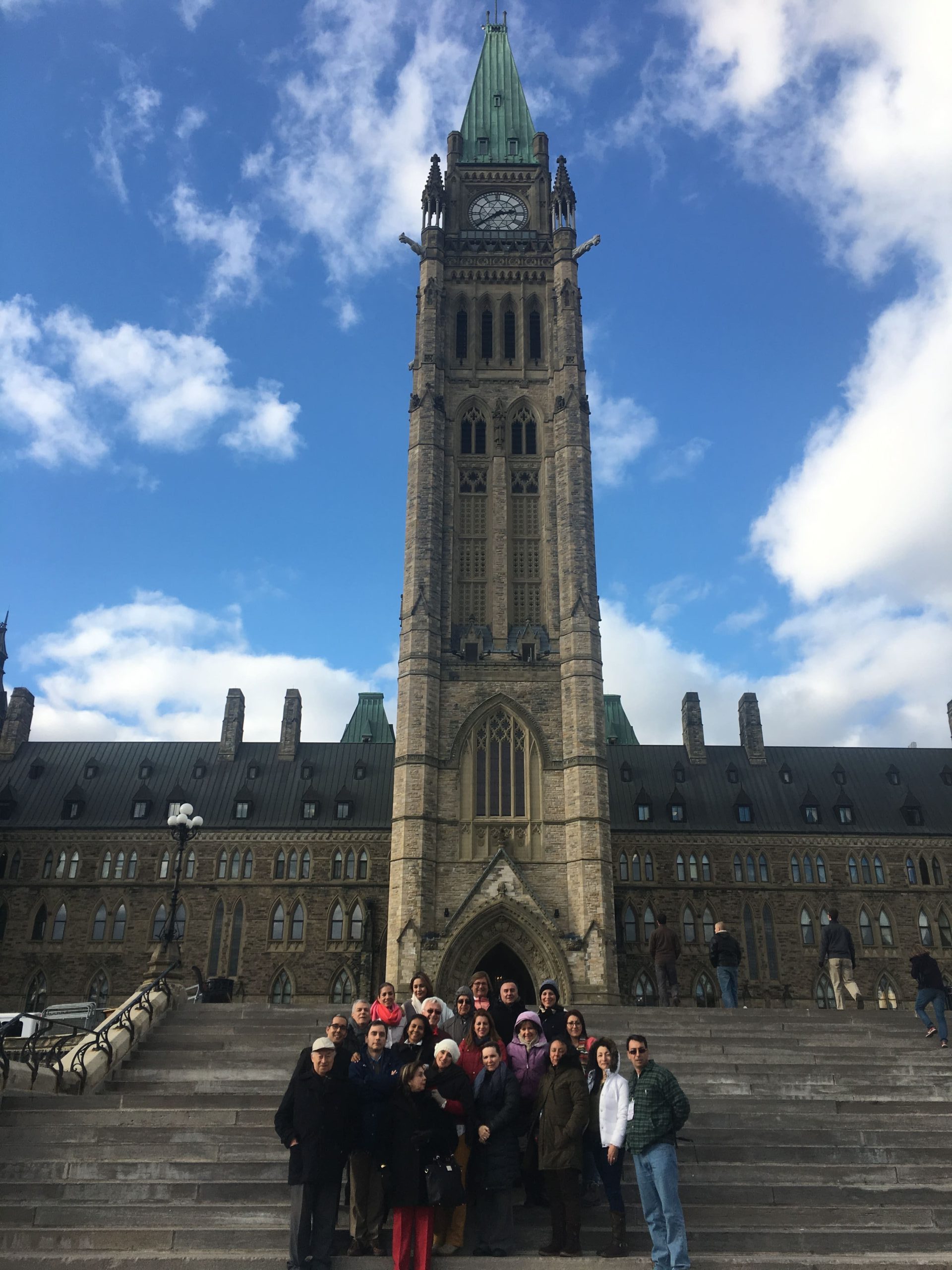 Group of people gathered around a tower