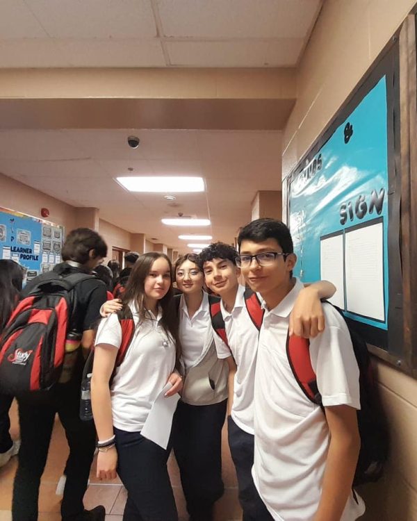 students together in the hallways of a school